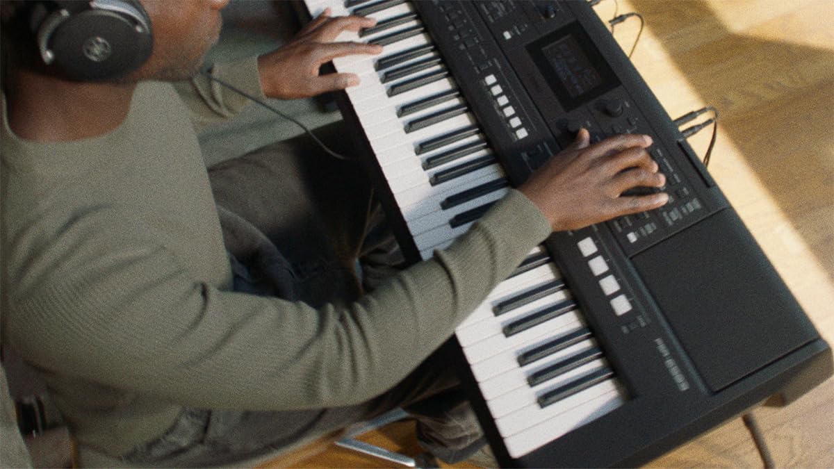 Yamaha PSR-E483, 61-Key Touch-Sensitive Portable Keyboard with Sound, Music Rest and Power Adapter