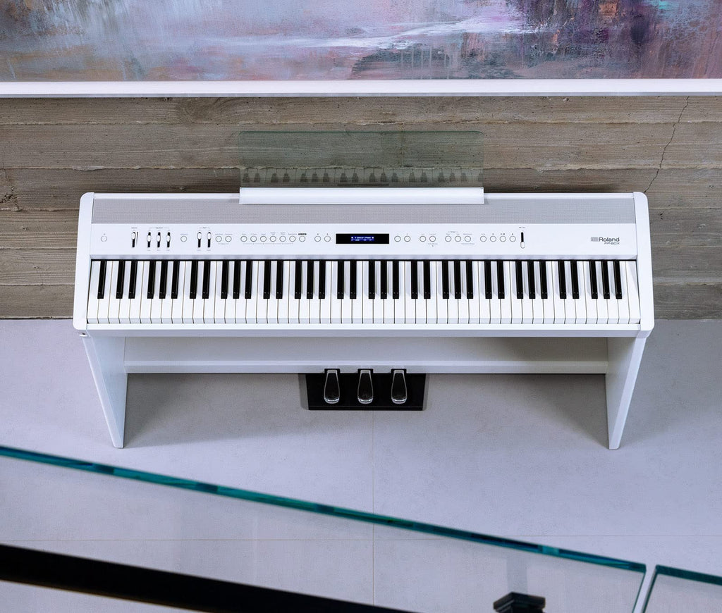 Roland FP-60X 88-Key Digital Piano - White Bundle with Adjustable Stand, Bench, Deluxe Sustain Pedal, Online Piano Lessons, Instructional DVD, and Austin Bazaar Polishing Cloth