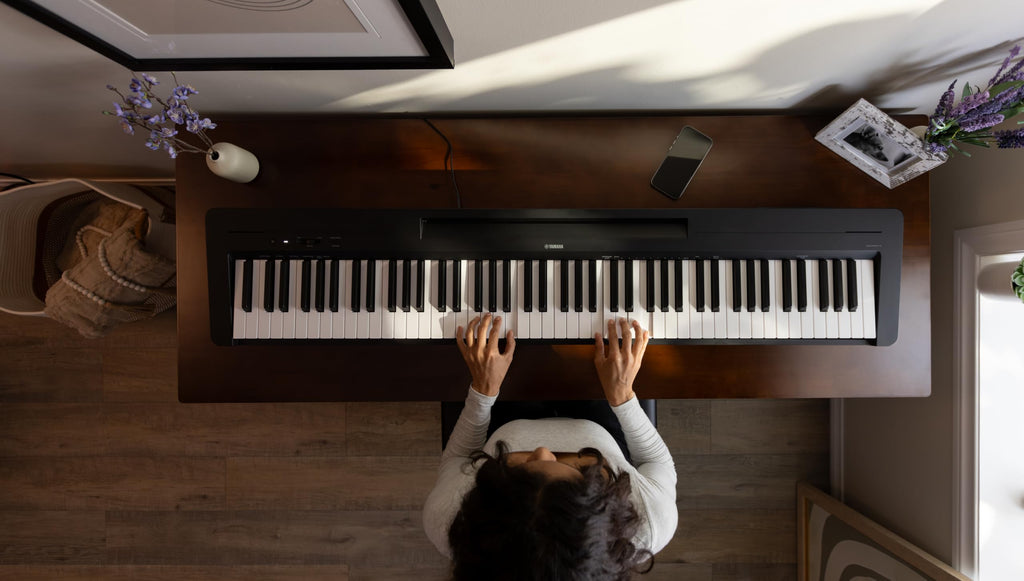 Yamaha P225 88-Key Digital Piano with Weighted Keys, Portable Design, Keyboard, Music Rest, Sustain Foot Switch, and Built-In Speakers, Black (P225B)