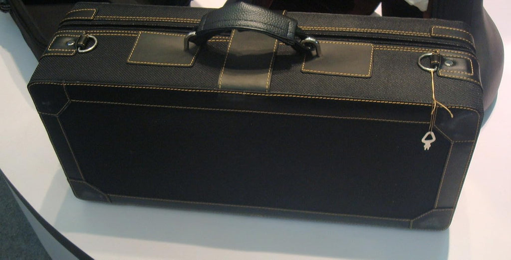 Eastern Music matt black alto saxopone with flower engravings.