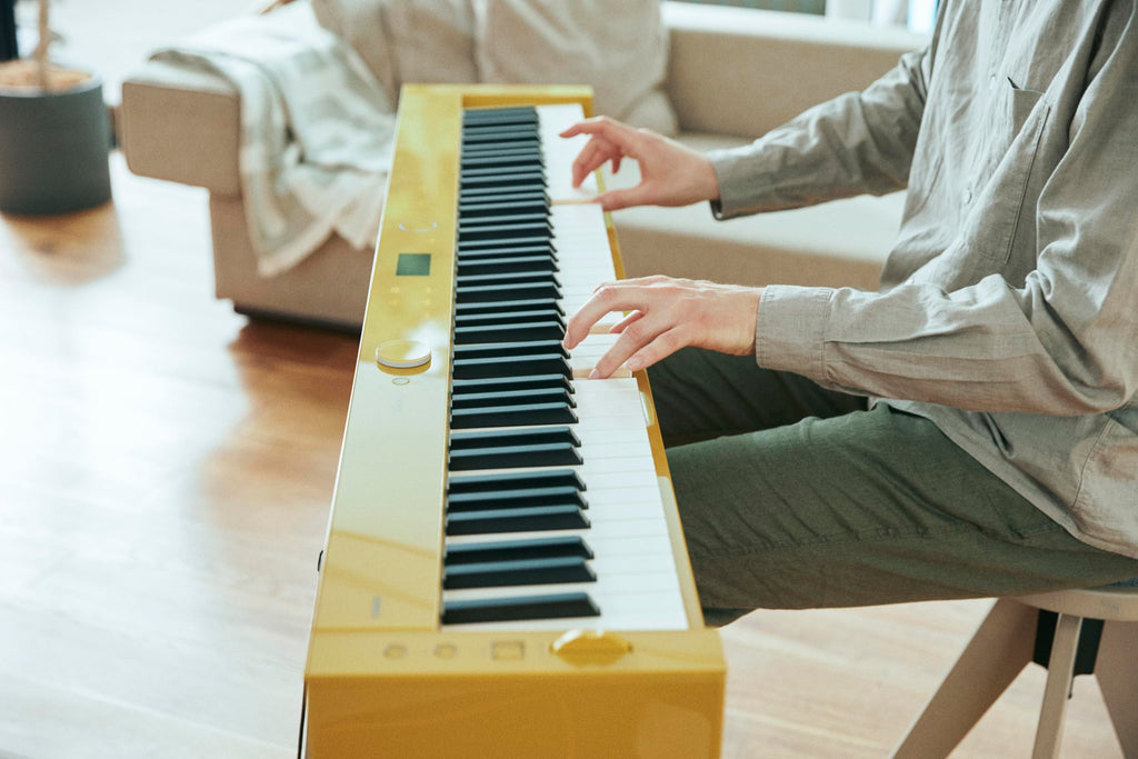 Casio Privia PX-S7000 Portable Digital Piano w/88 Hybrid Weighted Keys, 400 Tones, Touch Sensor Controls, Stand w/ 3 Pedals, Bluetooth, USB, AC Adapter, 32W Speakers, Harmonious Mustard (PX-S7000HM)
