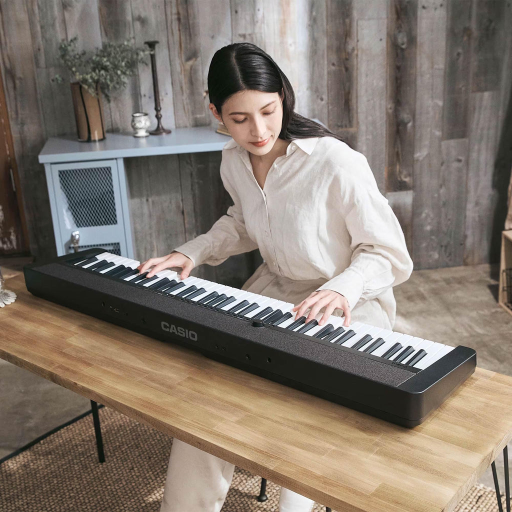 Casio CT-S1 Casiotone 61-Key Portable Keyboard - Black Bundle with Adjustable Stand, Bench, Headphones, Sustain Pedal, Instructional Book, Instructional DVD, and Austin Bazaar Polishing Cloth
