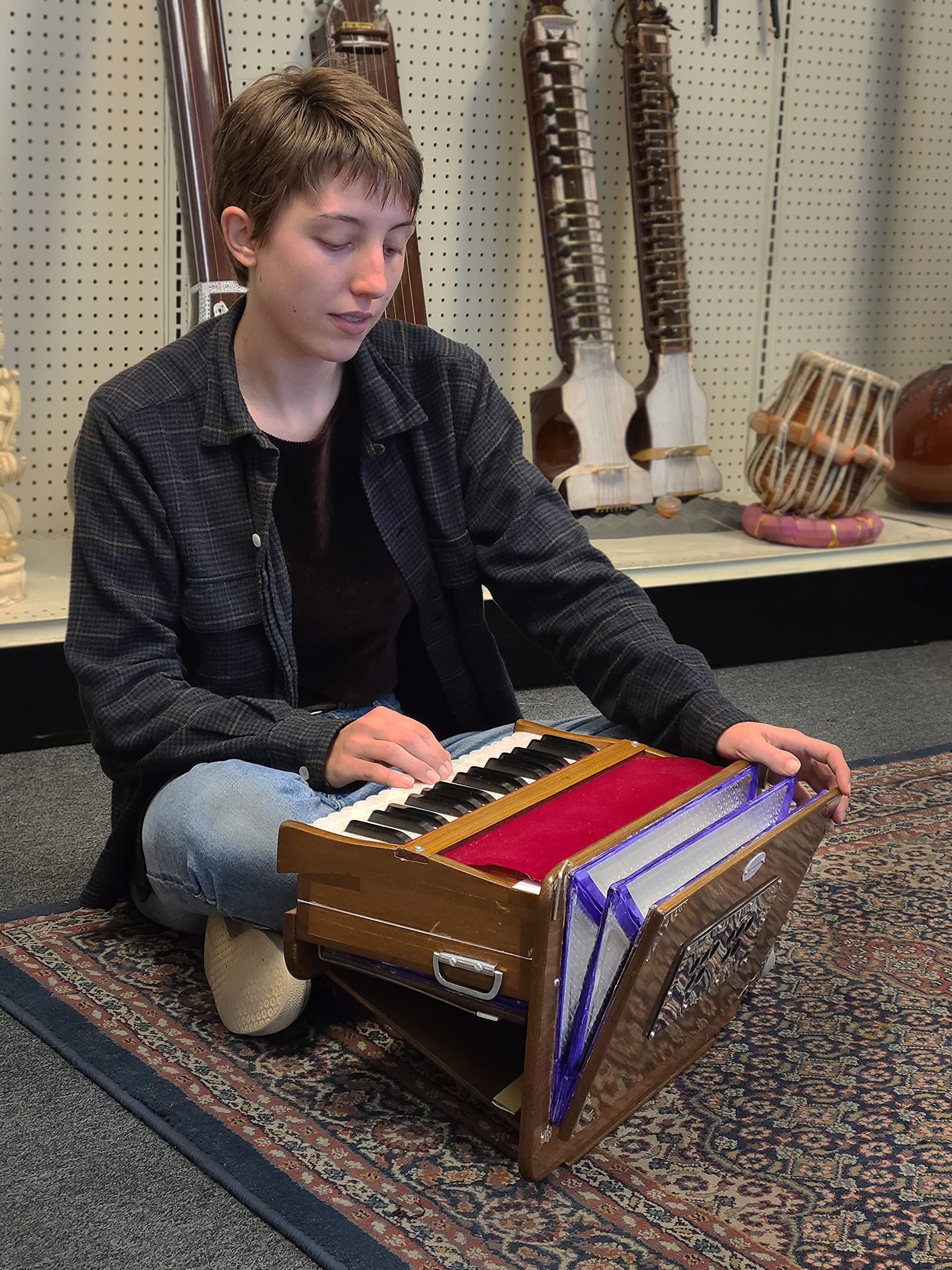 Musician's Mall Travel Harmonium Highly Portable Indian Instrument. Set-up, tuned and shipped from California, the oldest Indian Musical Instrument store in the US.